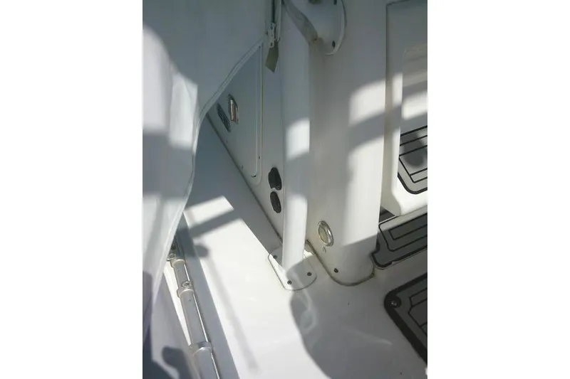 Slide: The Image of Interior view of a 2019 Sea Fox 248 Commander boat, showcasing seating and flooring details. - 61