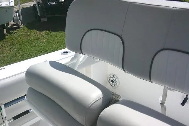 Slide: The Image of 2019 Sea Fox 248 Commander boat interior with white cushioned seating. - 62