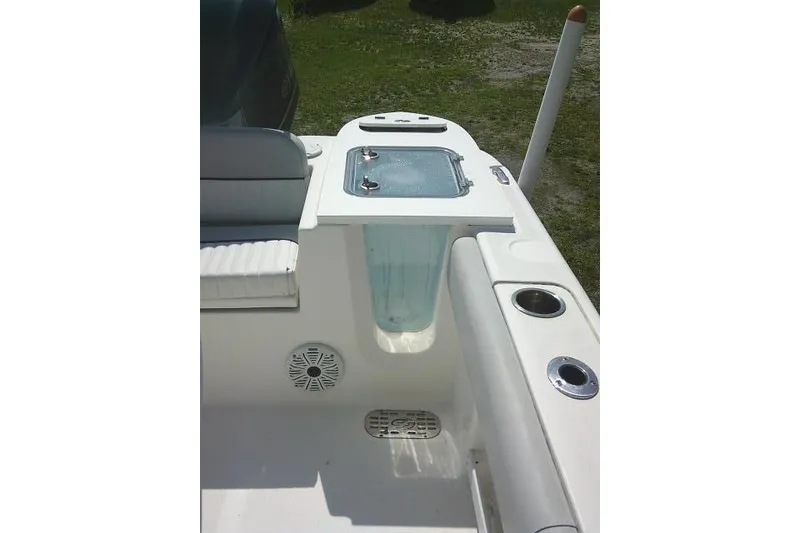 Slide: The Image of 2019 Sea Fox 248 Commander boat interior with seating and storage compartments. - 64