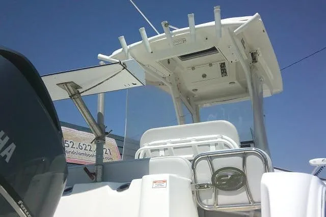 Slide: The Image of 2019 Sea Fox 248 Commander boat with Yamaha engine, featuring a sleek white design and T-top. - 9