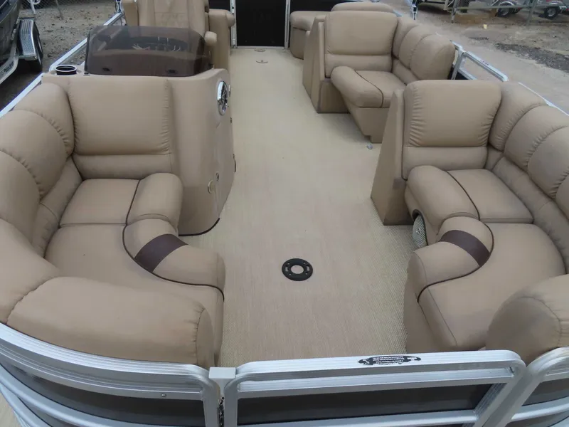Slide: The Image of Interior of 2016 Cypress Cay SeaBreeze 210 pontoon boat with beige seating. - 11