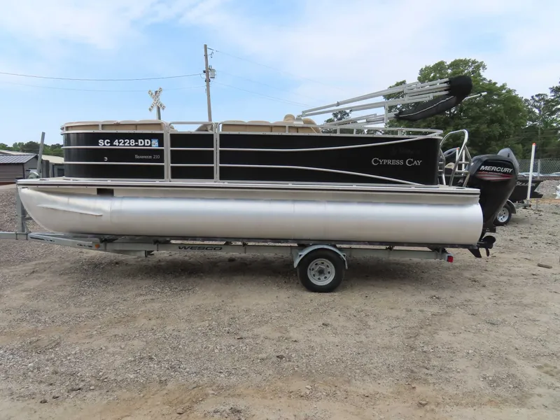 Slide: The Image of 2016 Cypress Cay SeaBreeze 210 Pontoon on trailer, side view. - 8