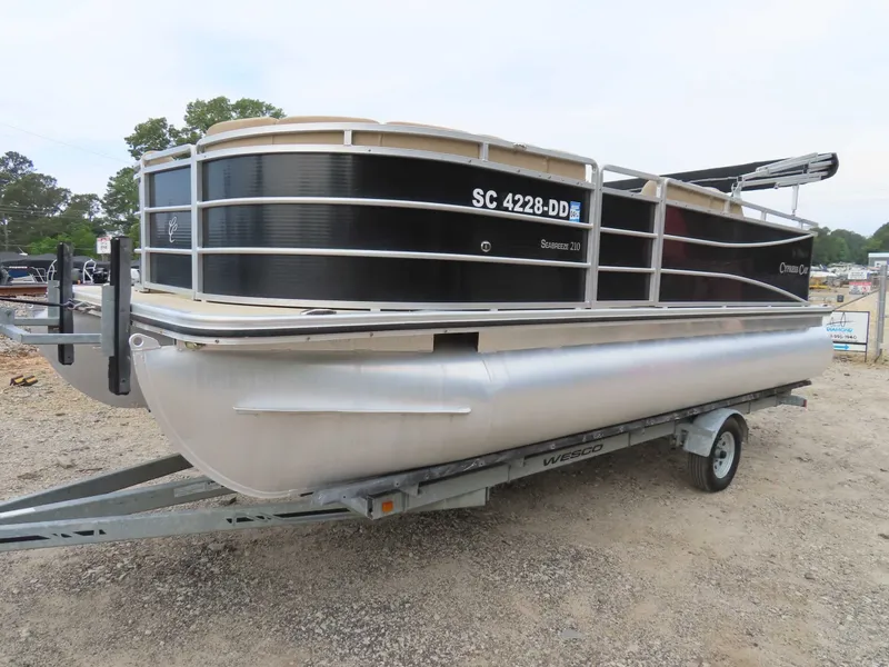 Slide: The Image of 2016 Cypress Cay SeaBreeze 210 Pontoon on trailer, side view. - 9