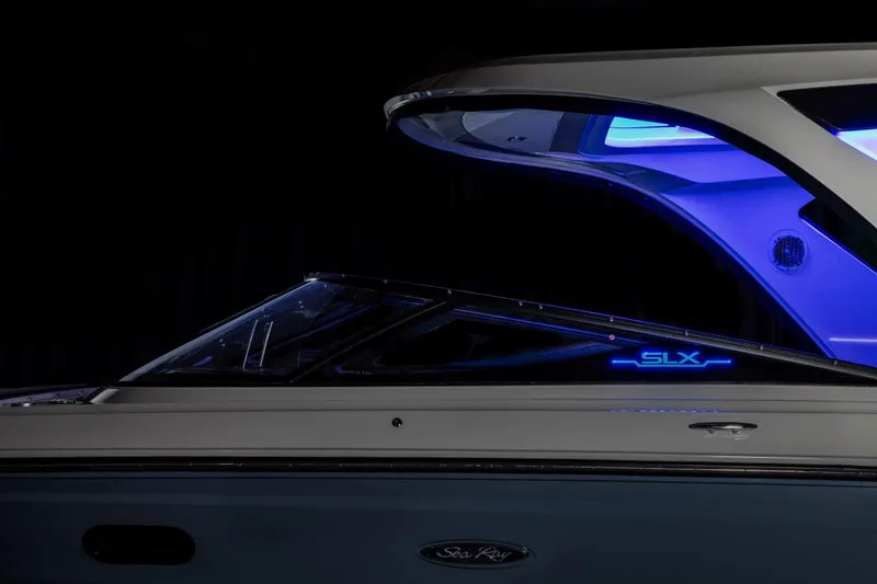 Slide: The Image of Sea Ray SLX 310 boat with blue lighting, year 2016. - 14