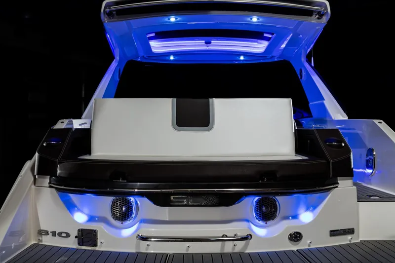 Slide: The Image of Rear view of 2016 Sea Ray SLX 310 yacht with blue LED lighting. - 17