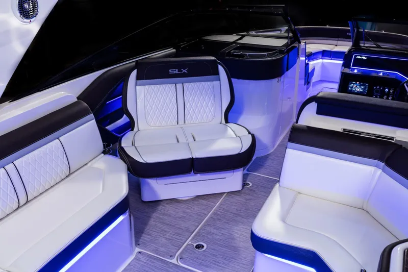 Slide: The Image of Interior of Sea Ray SLX 310 yacht, luxurious seating, LED lighting. - 24