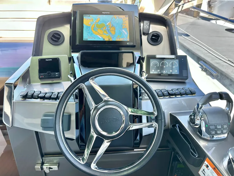 Slide: The Image of Helm of 2019 Galeon 485 HTS yacht featuring modern navigation technology. - 25