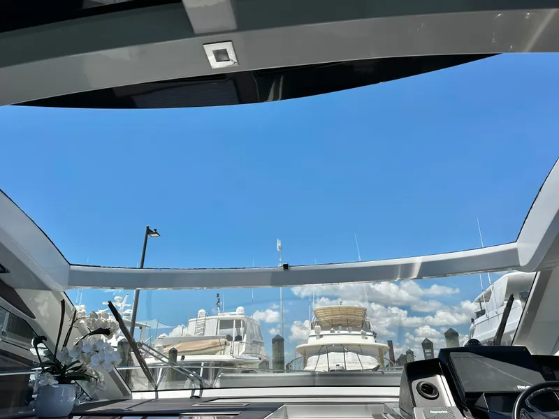 Slide: The Image of Interior view of 2019 Galeon 485 HTS yacht overlooking the marina. - 27