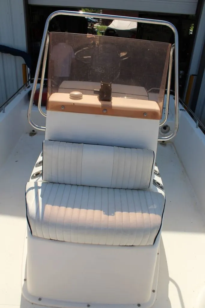 Slide: The Image of 2006 Clearwater 21CC boat with console and seating. - 4