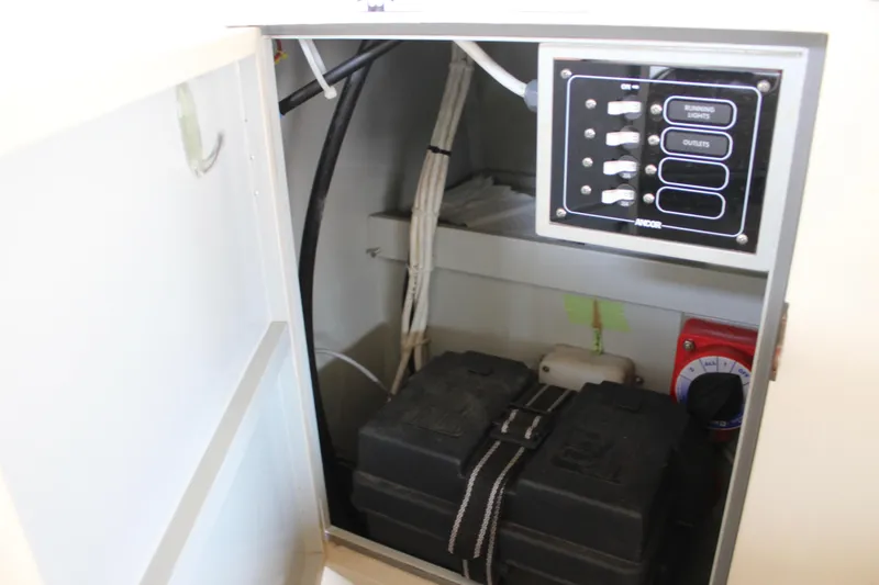Slide: The Image of Electrical panel and battery compartment of 2015 Custom Stambaugh Redwing 18' boat. - 23