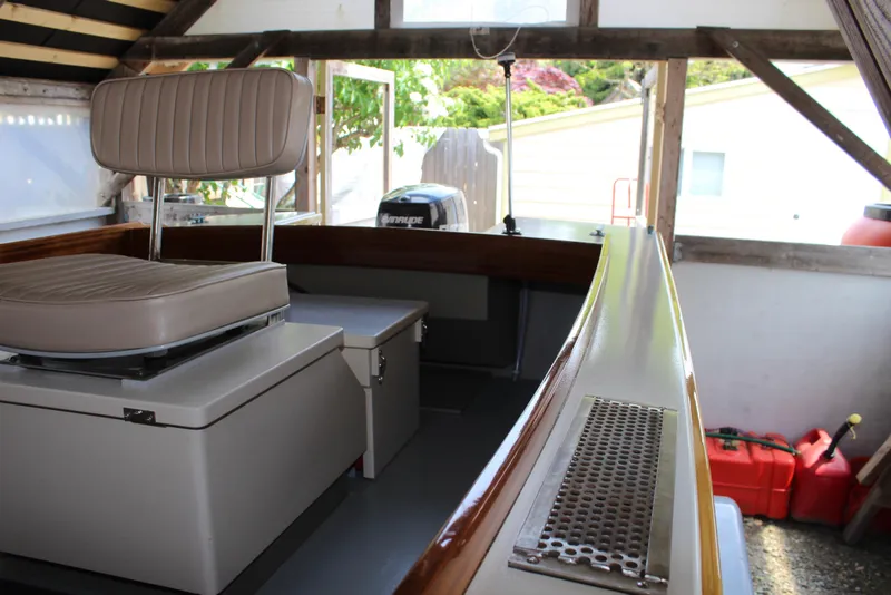 Slide: The Image of Interior of 2015 Custom Stambaugh Redwing 18' boat with seating and storage. - 32
