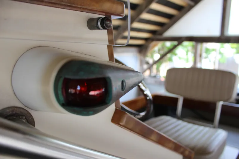 Slide: The Image of Close-up of a 2015 Custom Stambaugh Redwing 18' boat interior with navigation light. - 33