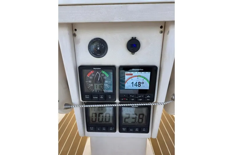 Slide: The Image of Control panel of a 2003 Bavaria 44 yacht with Raymarine instruments. - 10