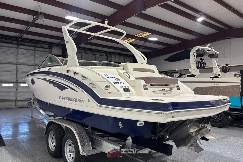 Slide: The Image of 2015 Chaparral 244 Sunesta boat on trailer in indoor storage facility. - 5