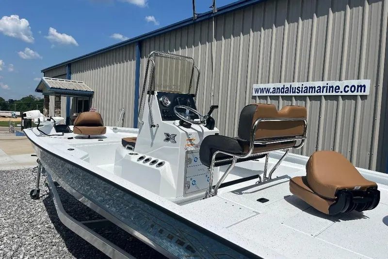 Slide: The Image of 2026 Xpress H20B Bay boat displayed at Andalusia Marine dealership. - 8