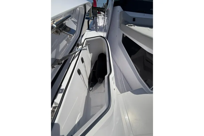 Slide: The Image of Storage compartment of 2025 Axopar 29 XC Cross Cabin boat, showcasing sleek design. - 29
