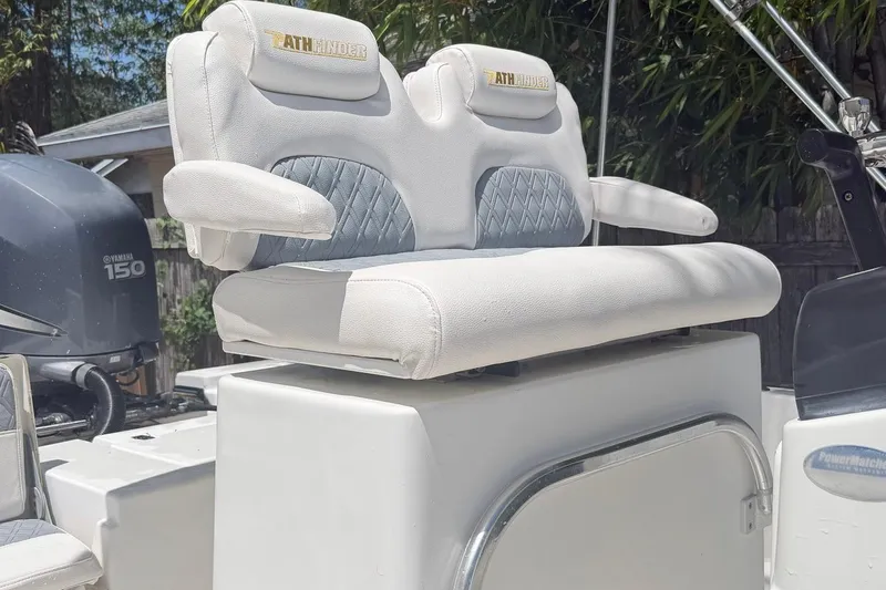 Slide: The Image of 2012 Pathfinder 2200 T boat seat with Yamaha 150 engine in background. - 6