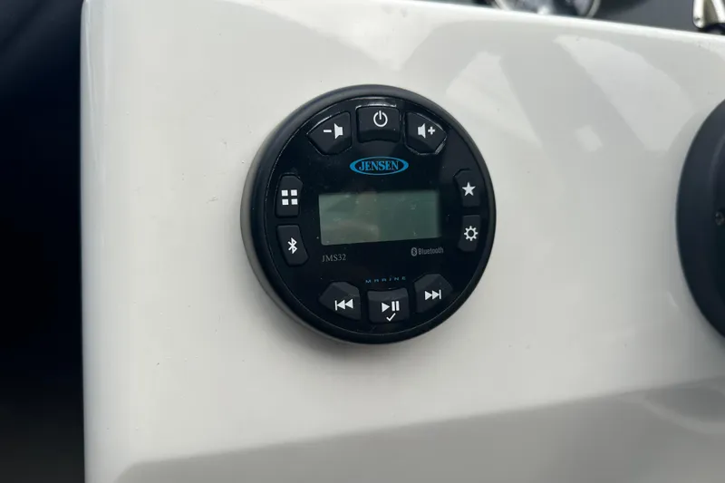 Slide: The Image of Jensen marine audio system on 2023 Bayliner Element M17 boat dashboard. - 16