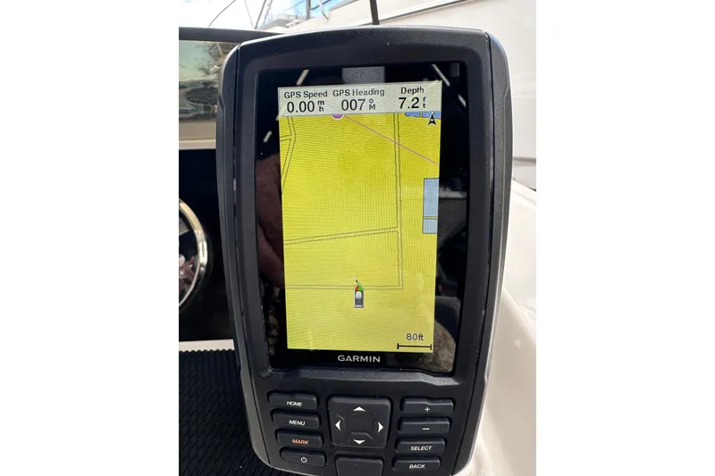 Slide: The Image of Garmin GPS display on 2023 Bayliner M17 boat showing navigation details. - 18