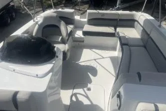 Slide: The Image of 2022 Hurricane SunDeck Sport 192 RL OB boat interior with spacious seating and modern design. - 9