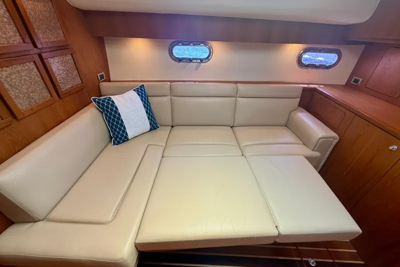 Slide: The Image of Luxurious interior of 2012 Tiara Yachts 4500 Sovran with cream leather seating. - 19