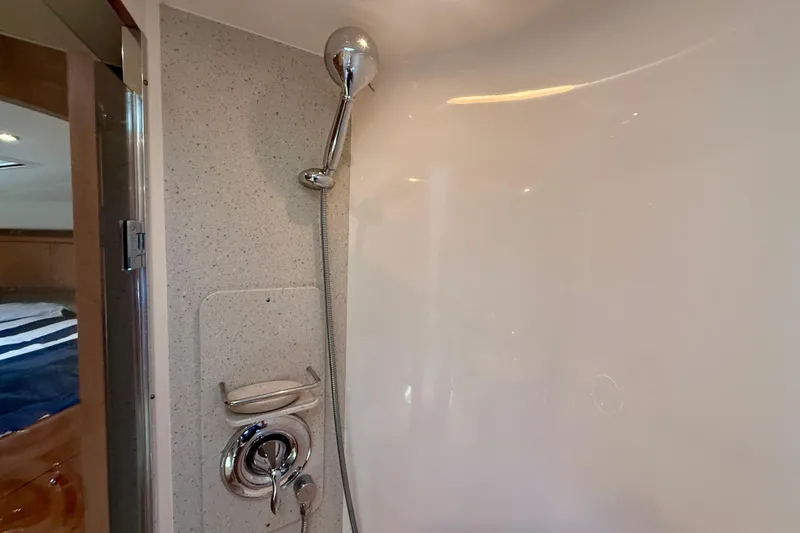 Slide: The Image of Shower area in 2012 Tiara Yachts 4500 Sovran, featuring modern fixtures and sleek design. - 40