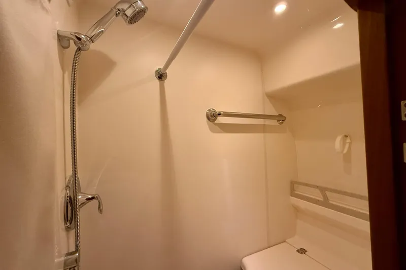 Slide: The Image of Shower area in 2012 Tiara Yachts 4500 Sovran, featuring modern fixtures and lighting. - 46