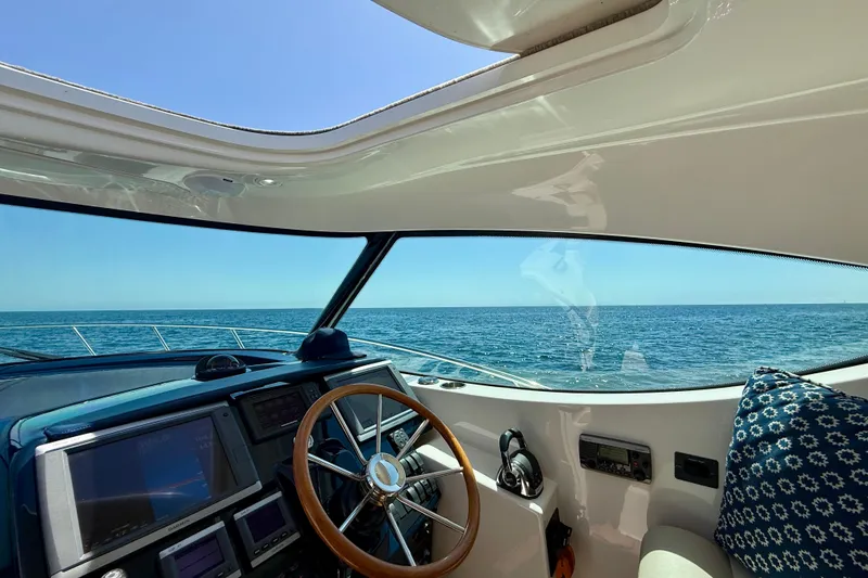Slide: The Image of Cockpit view of 2012 Tiara Yachts 4500 Sovran, overlooking the ocean. - 47