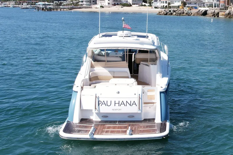 Slide: The Image of 2012 Tiara Yachts 4500 Sovran cruising in a scenic coastal area. - 6
