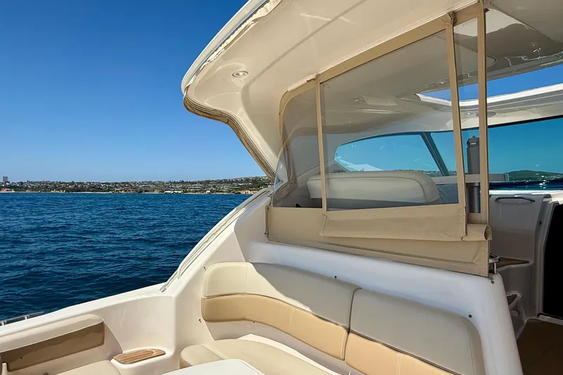 Slide: The Image of 2012 Tiara Yachts 4500 Sovran interior with ocean view and clear blue sky. - 61