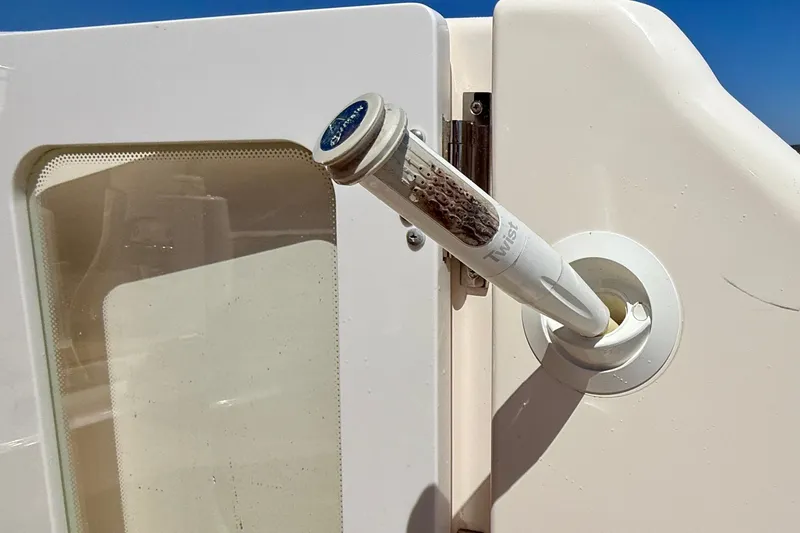 Slide: The Image of Close-up of a 2012 Tiara Yachts 4500 Sovran door handle mechanism. - 64
