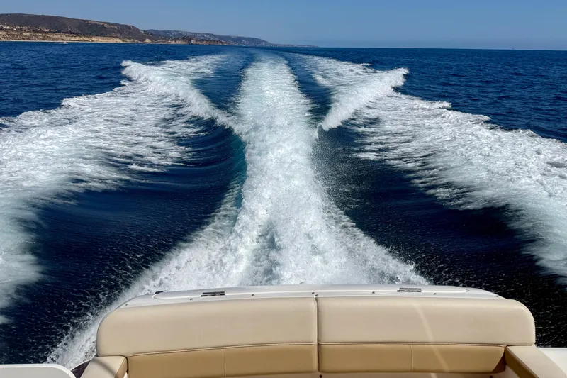 Slide: The Image of Wake of a 2012 Tiara Yachts 4500 Sovran cruising on open sea. - 67