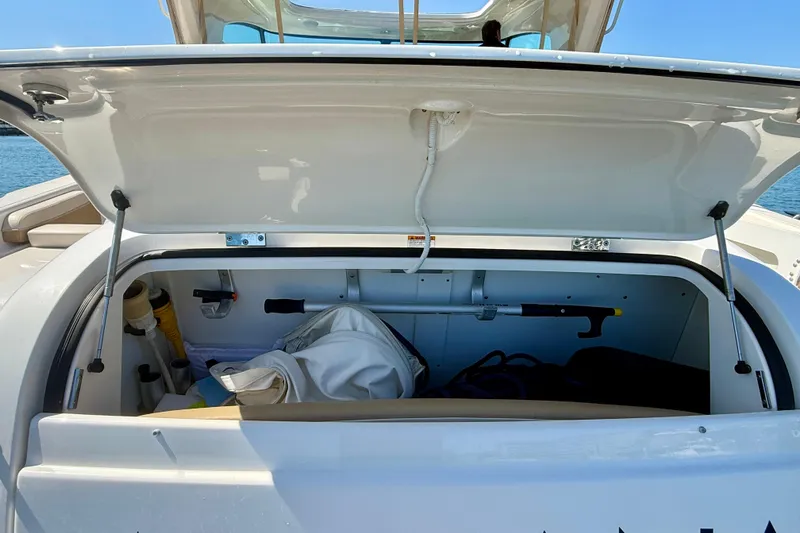 Slide: The Image of Open storage compartment on a 2012 Tiara Yachts 4500 Sovran, showcasing interior equipment. - 70
