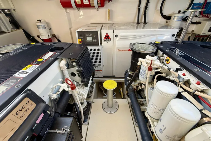 Slide: The Image of Engine room of 2012 Tiara Yachts 4500 Sovran with Cummins Onan generator. - 81