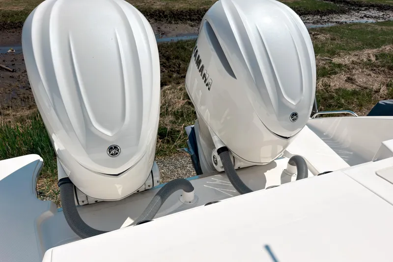 Slide: The Image of Twin Yamaha outboard engines on a 2025 Pursuit OS 325 Offshore boat. - 20