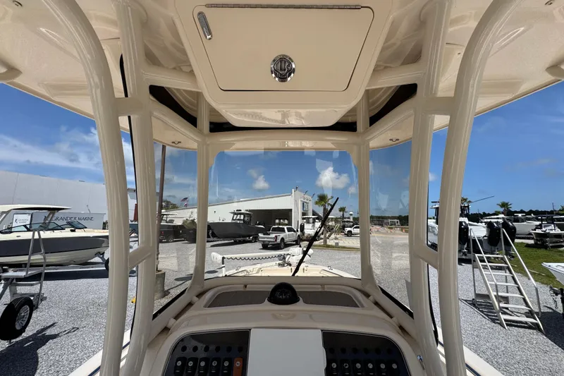 Slide: The Image of 2022 Grady-White Fisherman 257 boat interior view at a marina. - 29