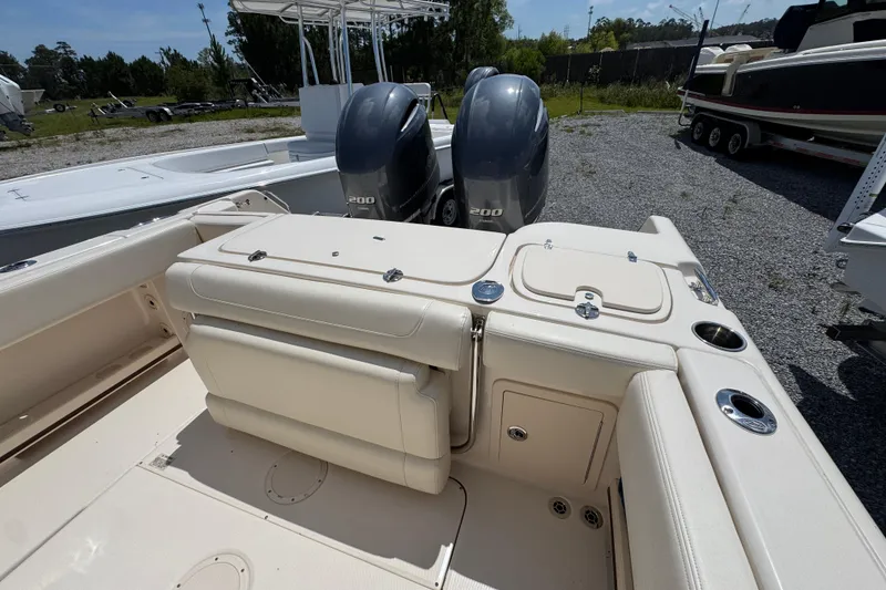 Slide: The Image of 2022 Grady-White Fisherman 257 boat with dual 200 horsepower engines, parked outdoors. - 32