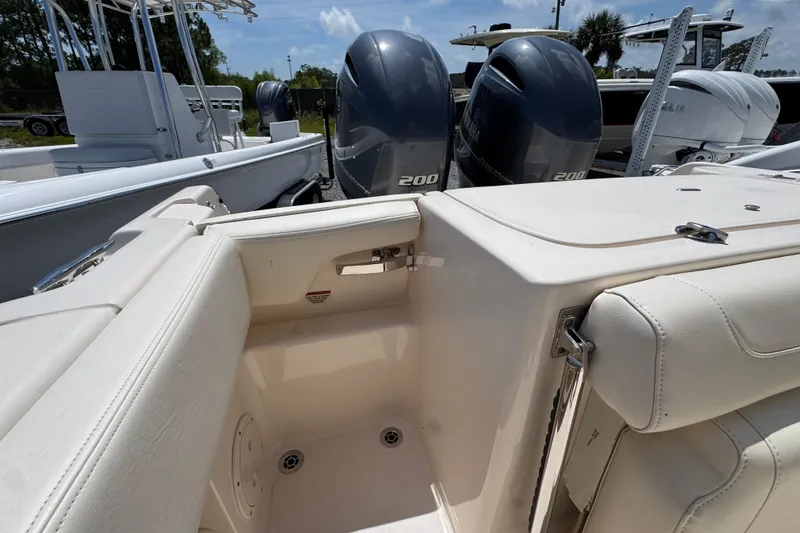 Slide: The Image of 2022 Grady-White Fisherman 257 boat interior with dual 200 horsepower engines. - 34