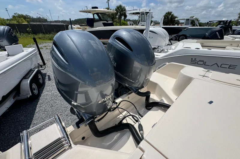 Slide: The Image of 2022 Grady-White Fisherman 257 with twin Yamaha 200 engines, docked outdoors. - 37