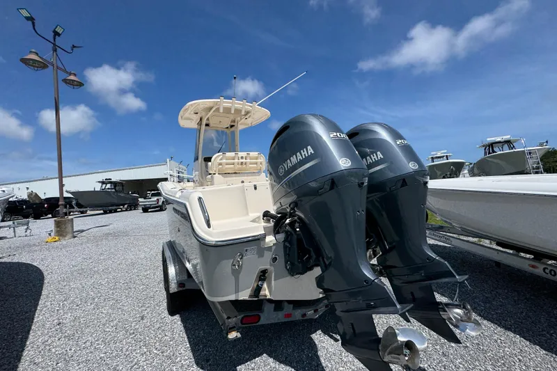Slide: The Image of 2022 Grady-White Fisherman 257 boat with dual Yamaha engines on a trailer. - 9