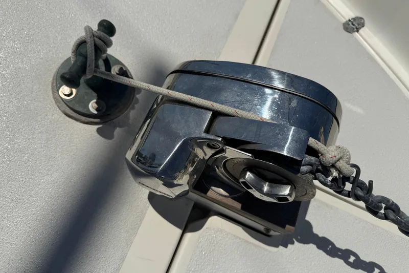 Slide: The Image of Chrome winch and rope on 1989 Gulf Pilot House boat deck. - 10