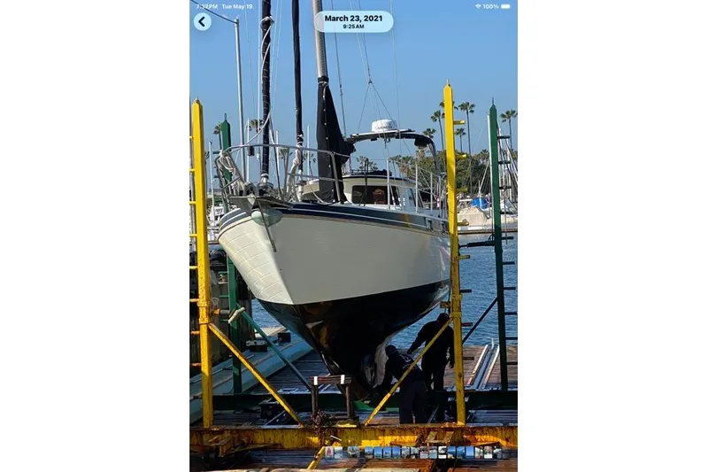 Slide: The Image of 1989 Gulf Pilot House sailboat in dry dock for maintenance. - 78