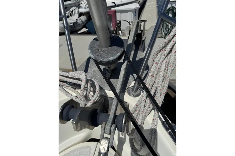 Slide: The Image of Close-up of 1989 Gulf Pilot House sailboat rigging and ropes on deck. - 9