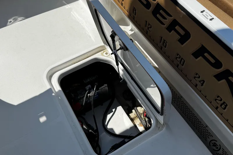 Slide: The Image of Open hatch on 2024 Sea Pro 239 Deep V CC boat deck. - 55