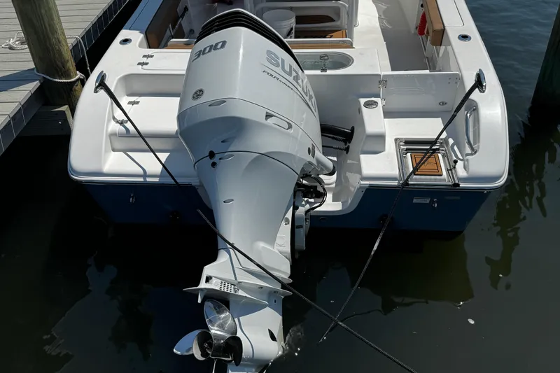 Slide: The Image of 2024 Sea Pro 239 Deep V CC boat with Suzuki 300 outboard engine at dock. - 61
