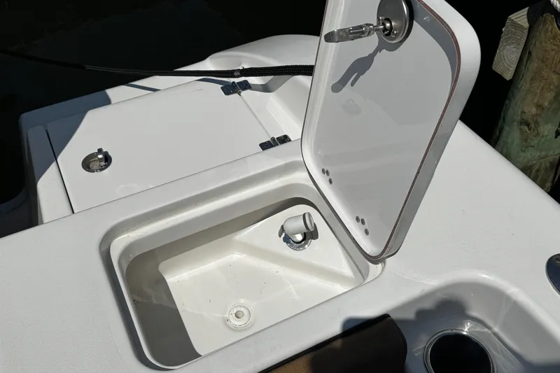 Slide: The Image of Open storage compartment on 2024 Sea Pro 239 Deep V CC boat. - 71