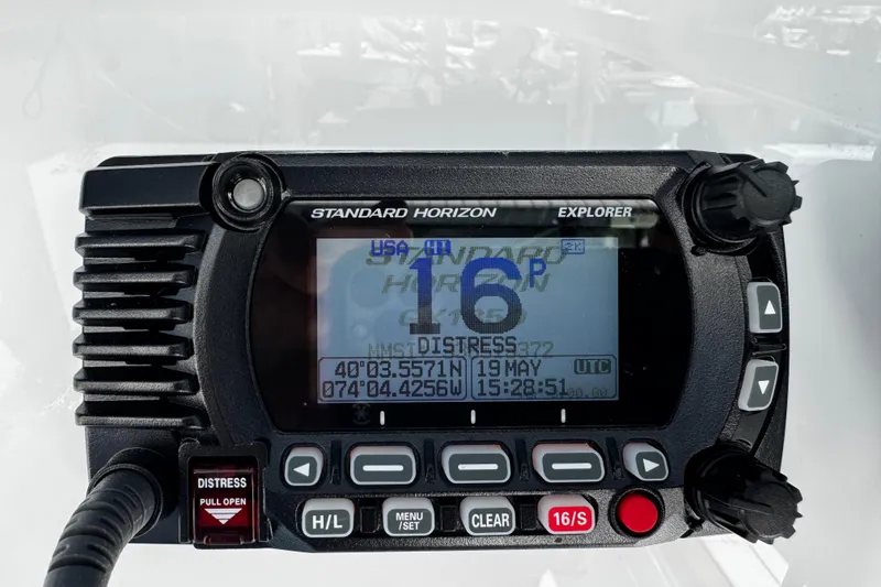 Slide: The Image of Standard Horizon Explorer marine radio on 2024 Sea Pro 239 Deep V CC boat. - 85