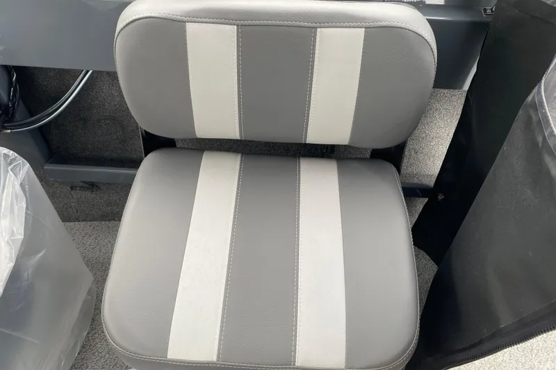 Slide: The Image of Gray and white seat in 2026 Hewescraft 160 Sportsman boat interior. - 11