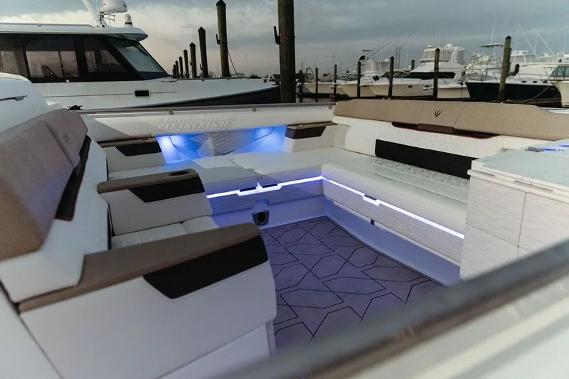 Slide: The Image of The image shows the stylish cockpit of a 2027 Ducari 37 XIV with elegant lighting. - 17
