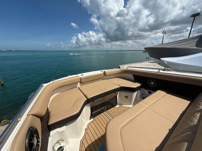Slide: The Image of Interior of 2023 Sea Ray SDX 250 Outboard with sleek design. - 11